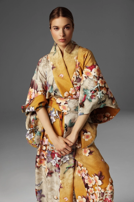 View of a model presenting the upper part of a silk kimono by Monika Adamska.