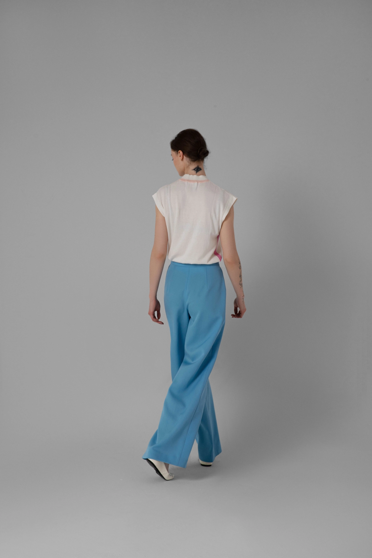 Monika Adamska blue lambswool trousers, wide-leg, model back view