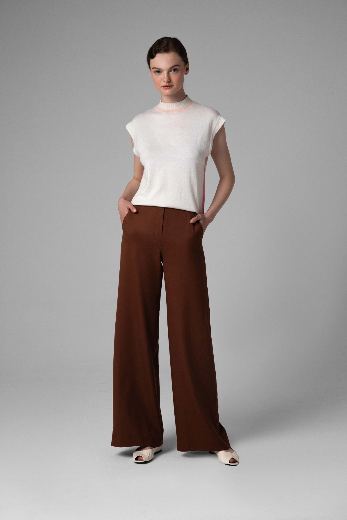 Monika Adamska brown wool trousers, wide legs, front view on the model