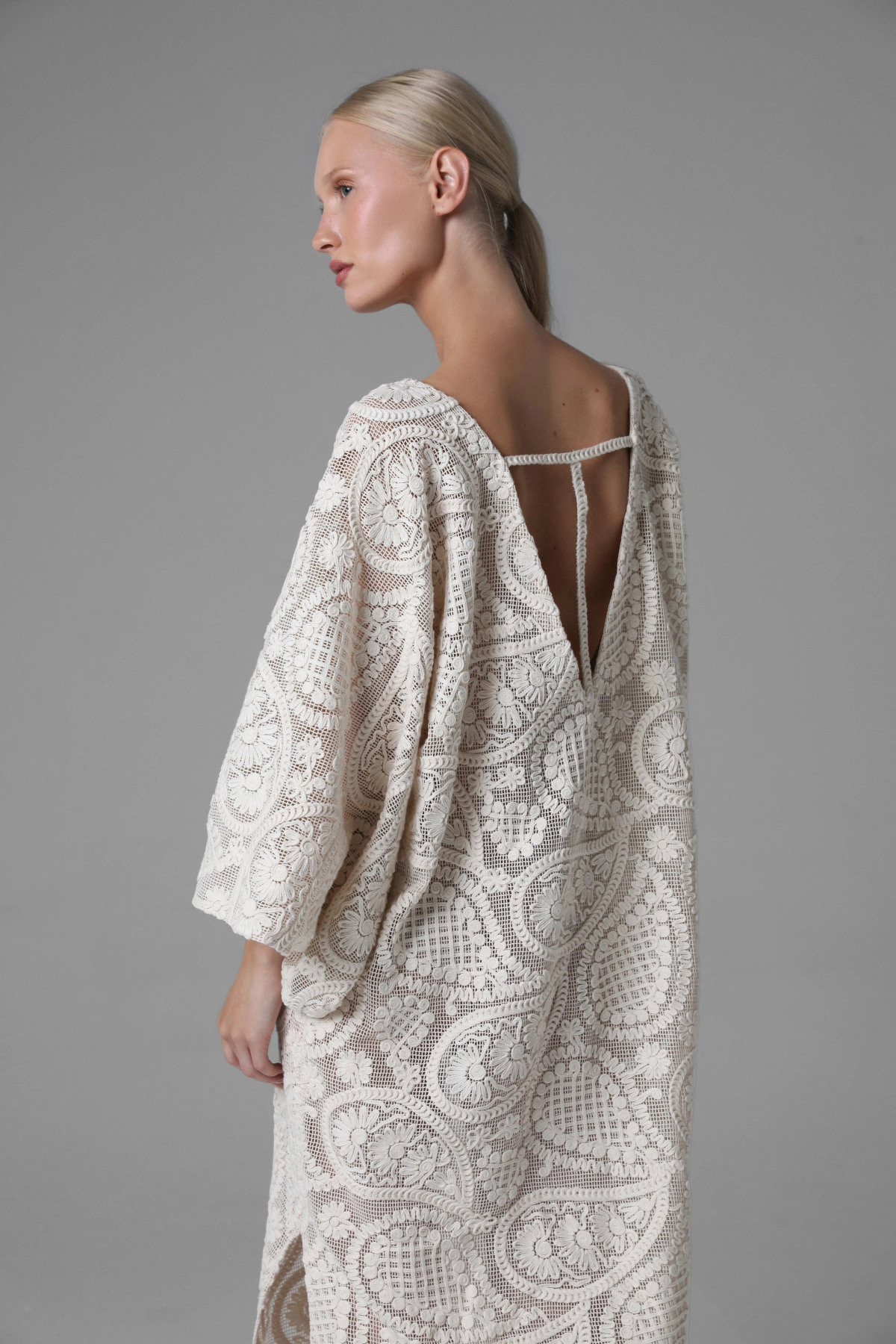 Openwork crochet look dress with paisley pattern, deep back neckline detail