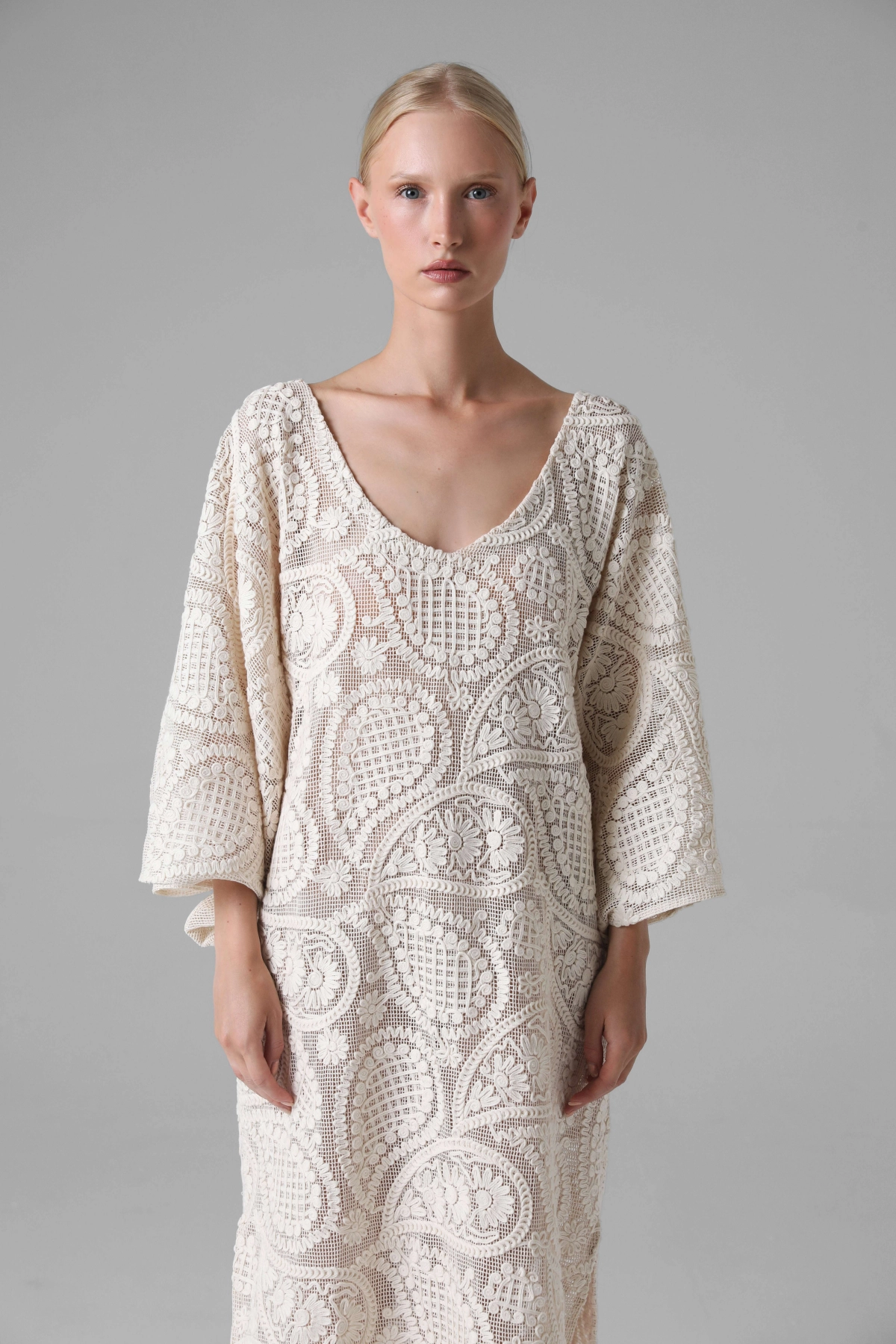 Model wearing crochet look summer dress, cotton openwork, front view