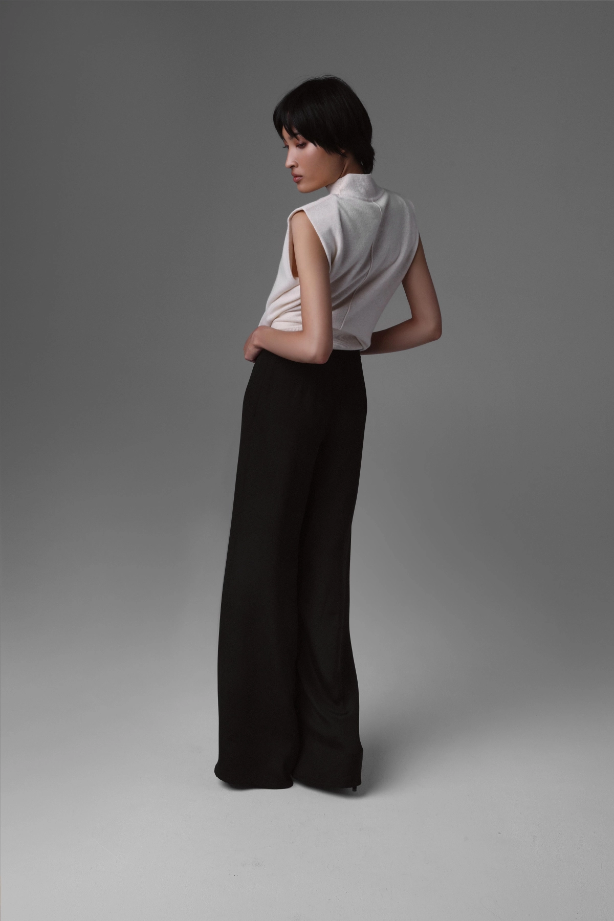 The fit at the hips and the line of the wide legs in matte silk.