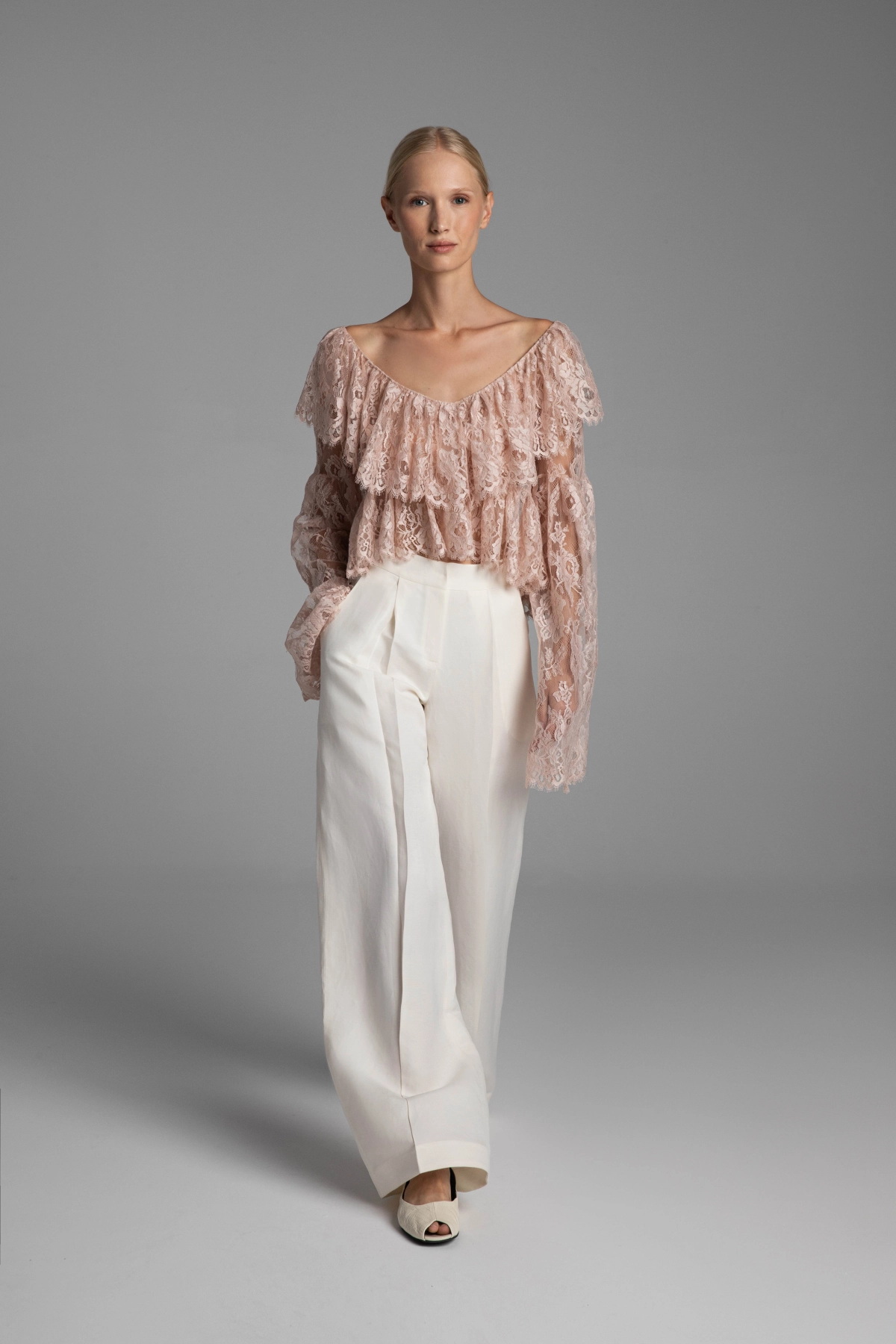 Monika Adamska wide-leg trousers in off-white linen and silk blend styled with a lace blouse.